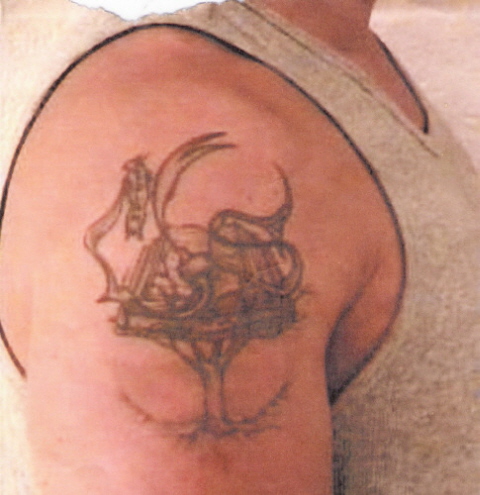 TracFone Suspect Ali Houssaiky's Islam Tattoo